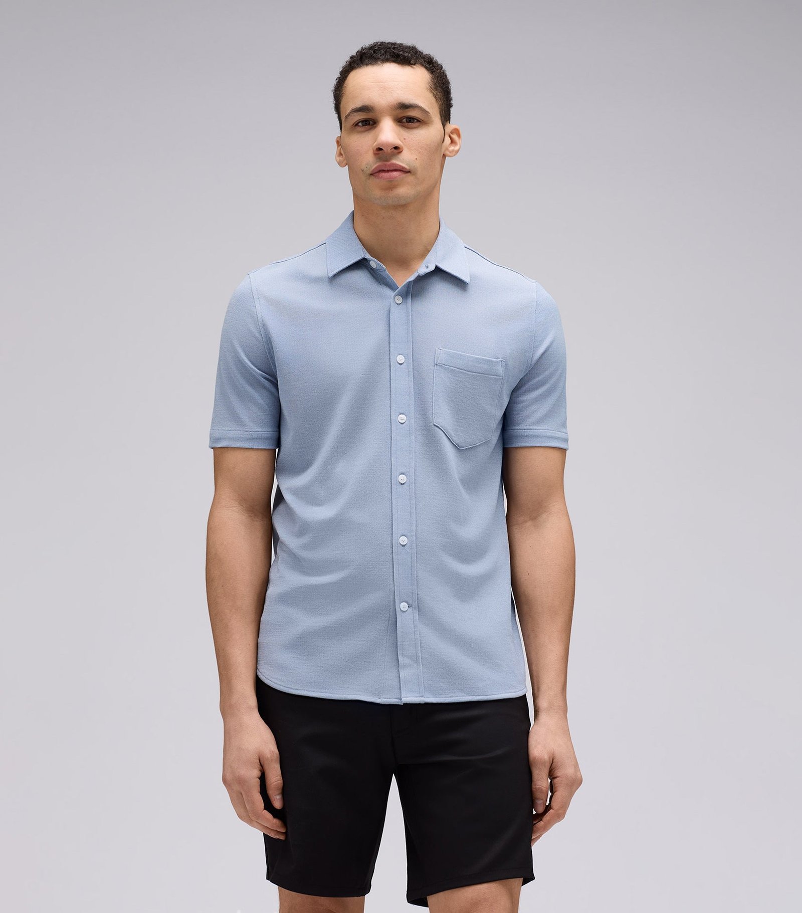 unbound-merino-short-sleeve-merino-button-up-light-blue-4-sq_022b6431-47d8-4411-9179-b8926502b7e0.jpg
